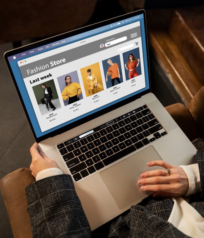 Laptop screen showing a fashion store webpage with model photos and a 'Last week' section.